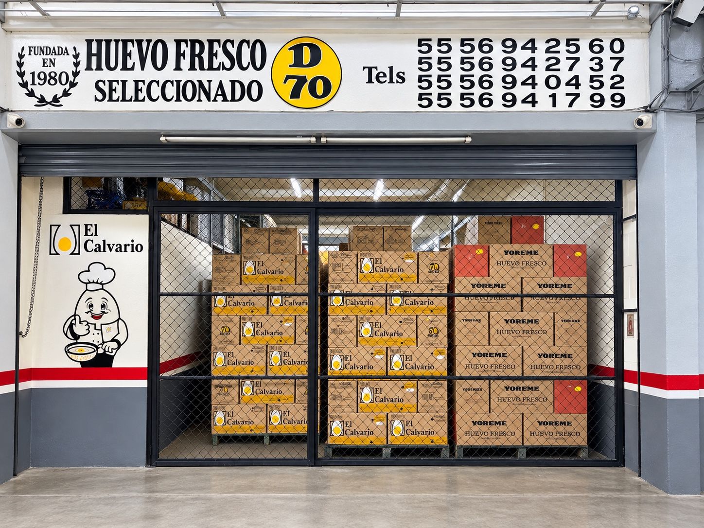 Fachada de la Bodega D-70 en la Central de Abasto, con cajas El Calvario y Yoreme